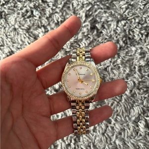 Simple gold and silver watch